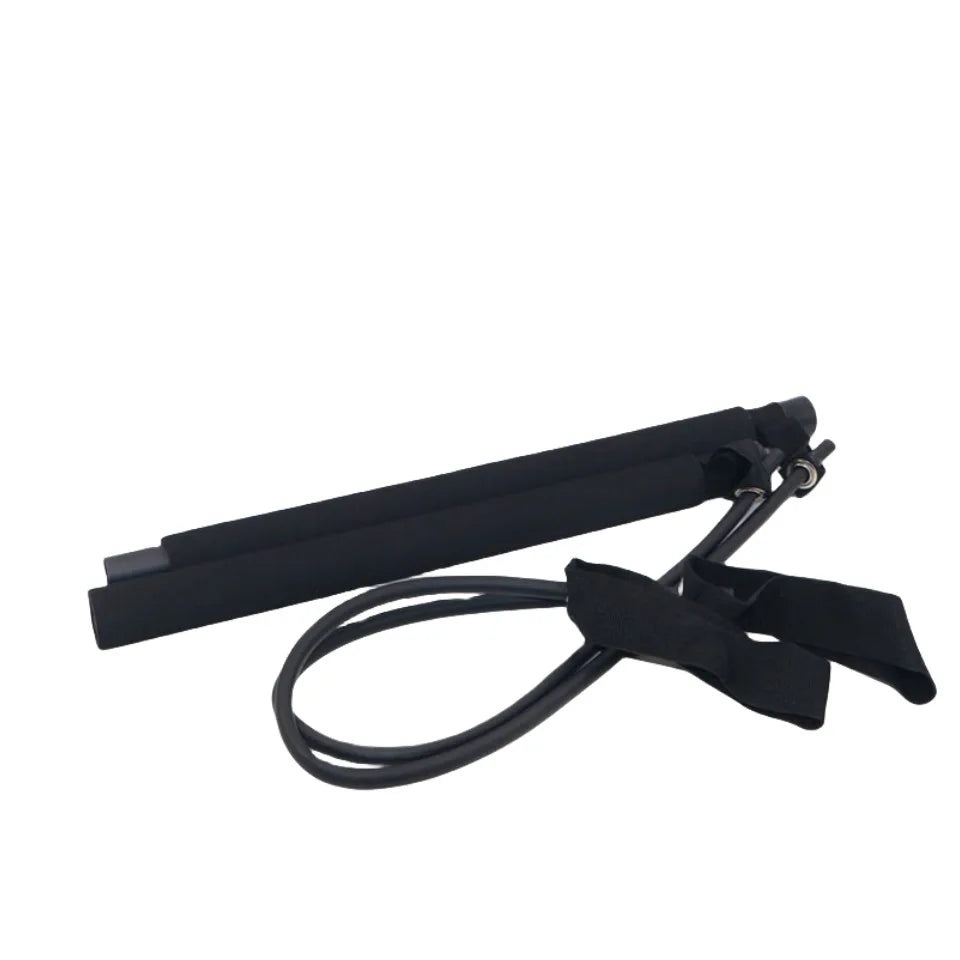 Black resistance band with handles and ankle straps for strength training and exercise