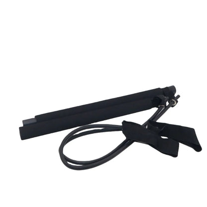 Black resistance band with handles and ankle straps for strength training and exercise