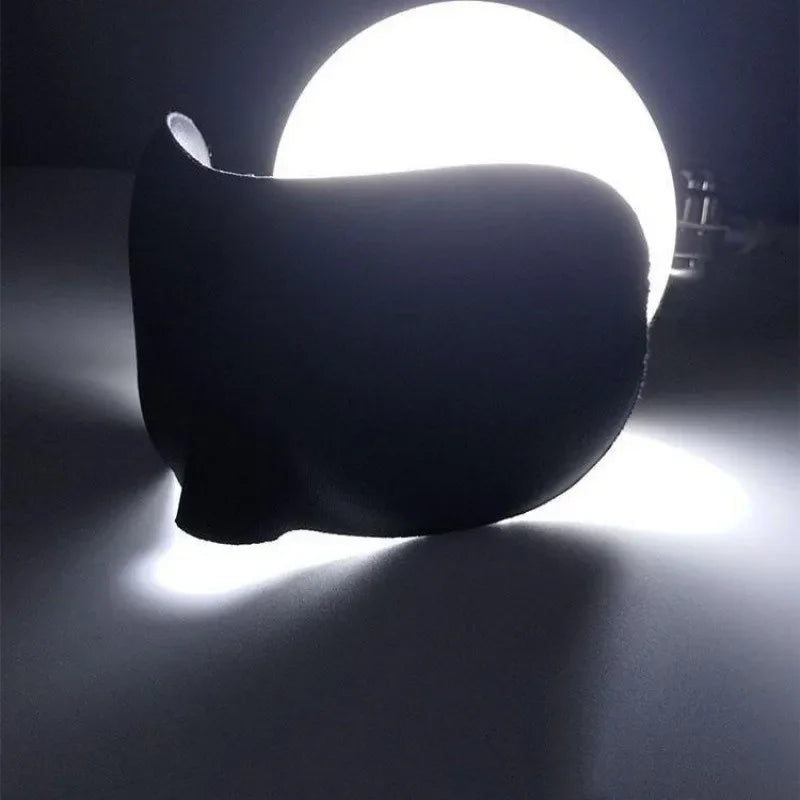Zorelie.co 3D sleep mask for total blackout shown in black with curved design blocking light