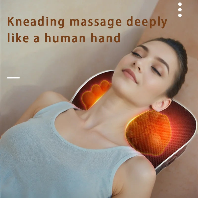 Woman relaxing using electric shiatsu neck and back massager with glowing kneading nodes