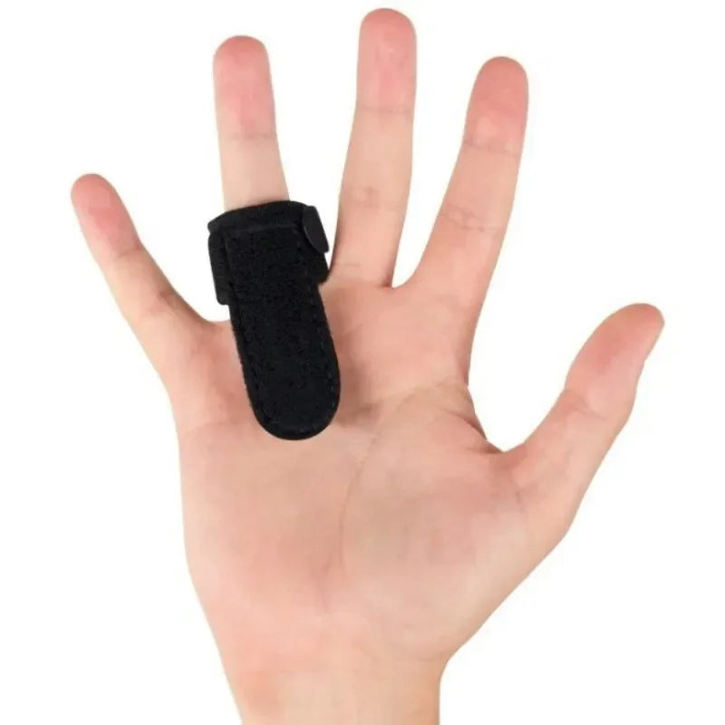 Black trigger finger splint worn on middle finger to provide finger support and immobilization
