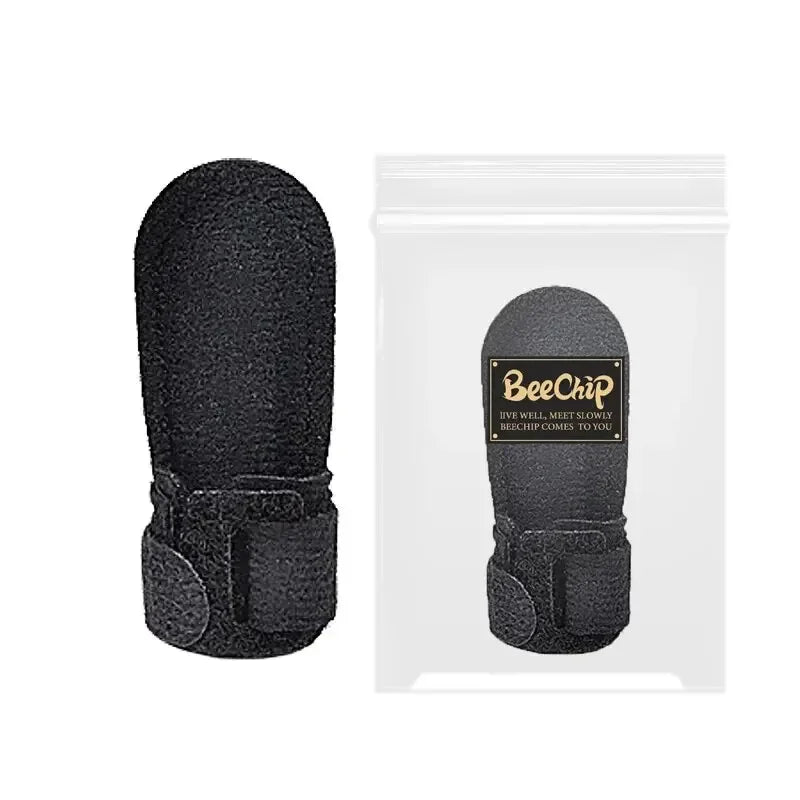 Black trigger finger splint with adjustable strap shown inside and outside clear packaging