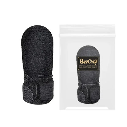 Black trigger finger splint with adjustable strap shown inside and outside clear packaging