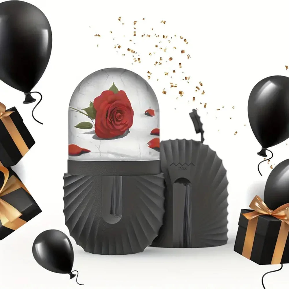 Zorelie.co black ice roller for face and eyes with rose design surrounded by black balloons and gift boxes