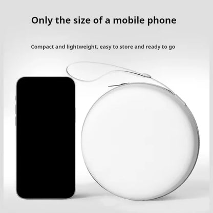 Compact memory foam travel neck pillow by Zorelie.co next to a mobile phone for size comparison