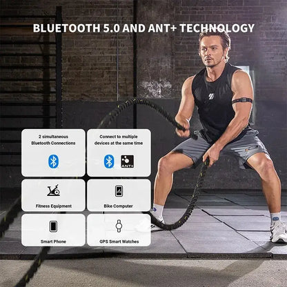 Man exercising with armband heart rate monitor BLE5.0 using Bluetooth 5.0 and ANT+ technology for fitness tracking