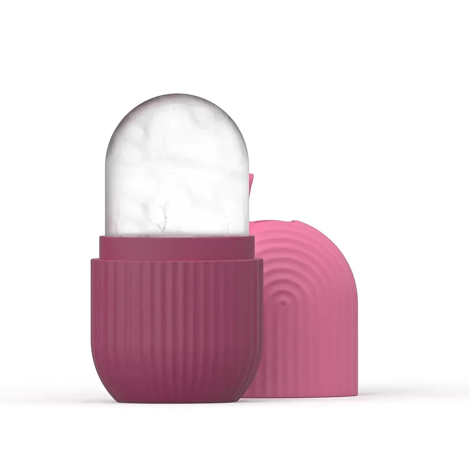Zorelie.co ice roller for face and eyes with pink textured base and clear rolling head