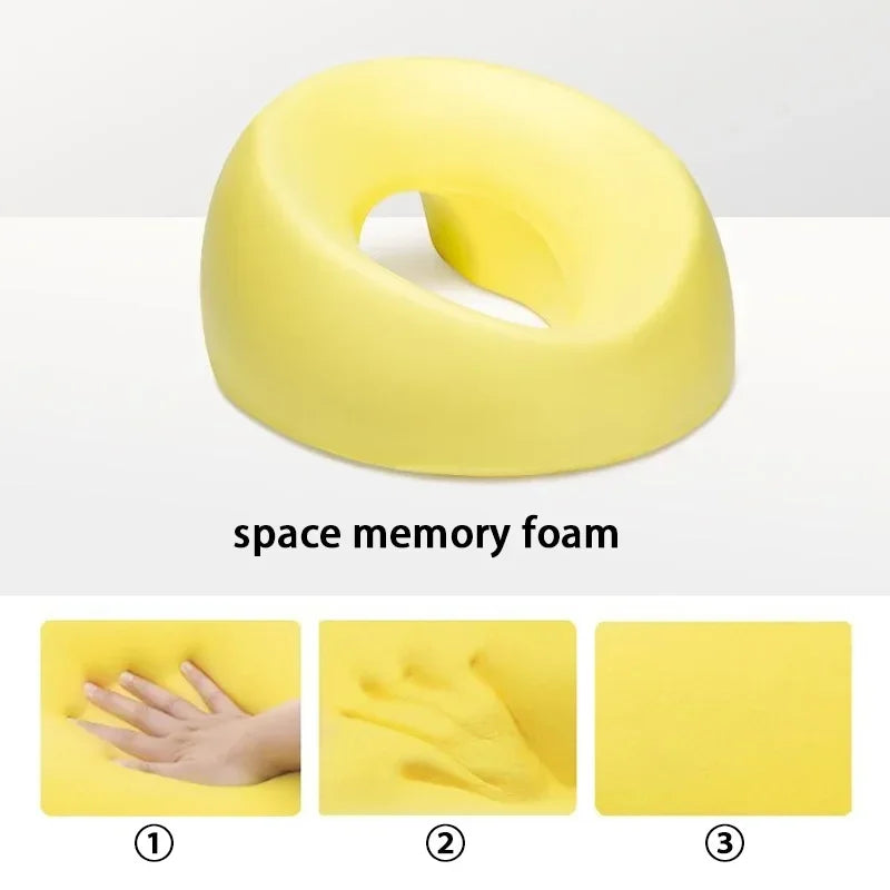 Yellow ergonomic memory foam headrest by Zorelie.co showing soft space memory foam and hand impressions