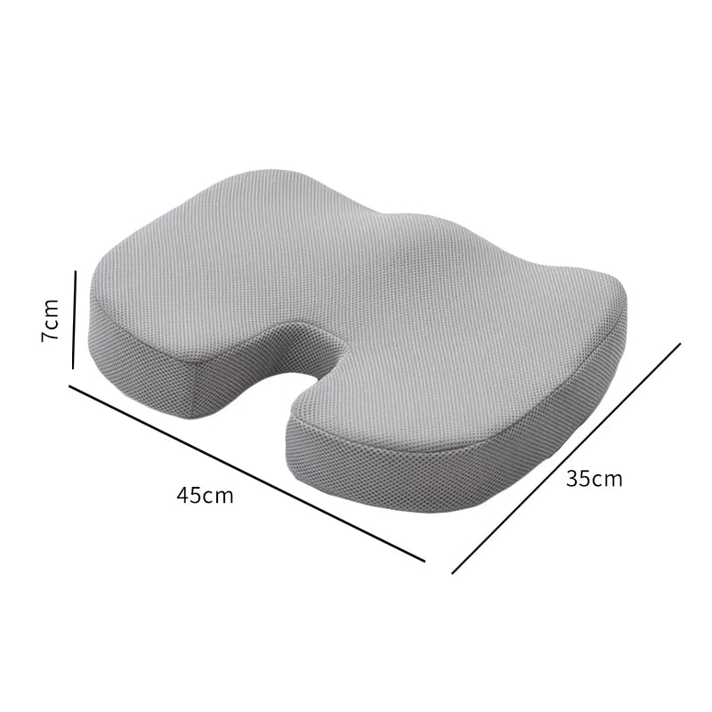 Gray ergonomic memory foam seat cushion with contoured design and dimensions 45 by 35 by 7 centimeters