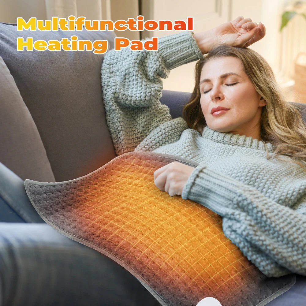 Woman relaxing on couch using electric heating pad for pain relief on her abdomen