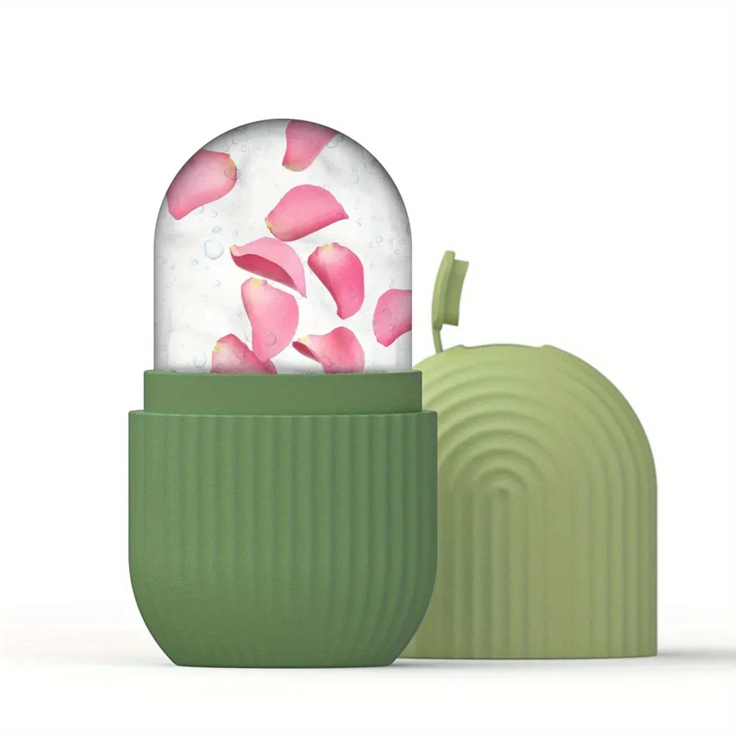 Green ice roller for face and eyes with clear dome containing pink rose petals and textured base