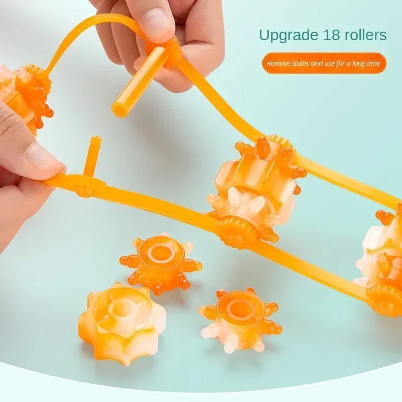 Handheld muscle massage roller with 18 orange detachable rollers for deep tissue relief