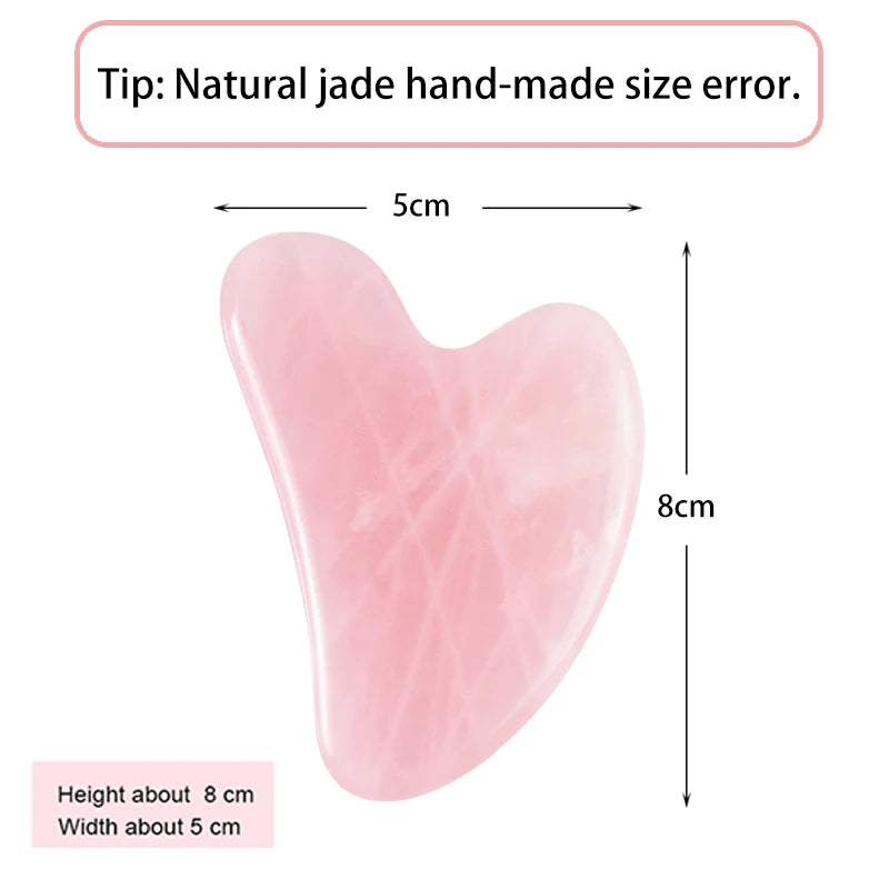 Pink natural stone gua sha facial tool made of jade with smooth curved edges measuring 8 by 5 centimeters