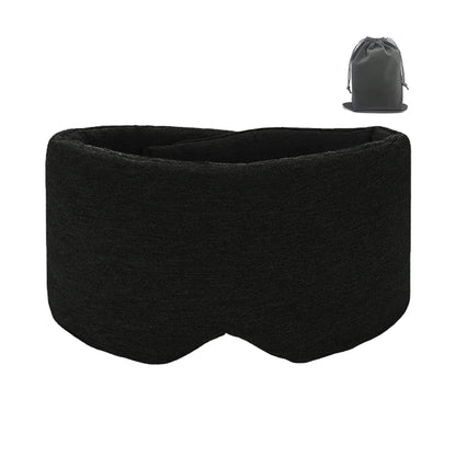 Black handmade cotton sleep mask with soft fabric and adjustable fit next to a small black drawstring pouch
