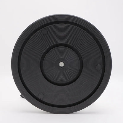 Black magnetic waist twisting disc with circular ridges for fitness exercise