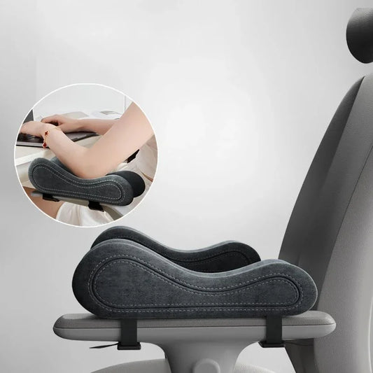 Memory foam armrest pads in black attached to office chair armrest for ergonomic support