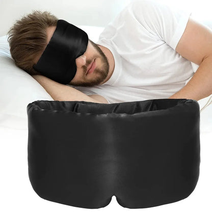 Zorelie.co black mulberry silk sleep mask worn by a man resting for comfortable and restful sleep