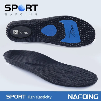 Black and blue shock absorbing insoles for running with high elasticity and textured surface