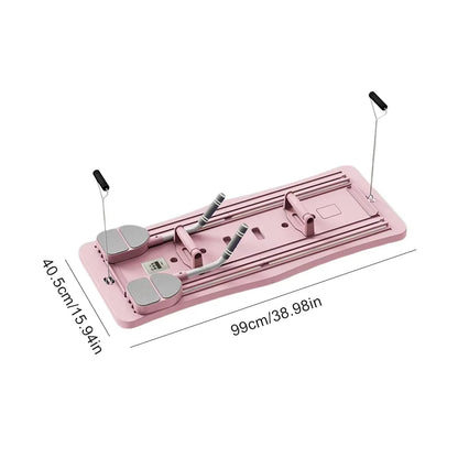 Pink foldable Pilates reformer board with resistance bands and handles from Zorelie.co