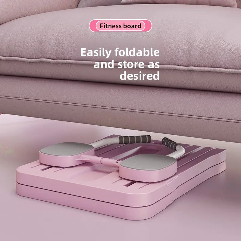 Pink foldable Pilates reformer board neatly stored under a couch showcasing easy fold and storage