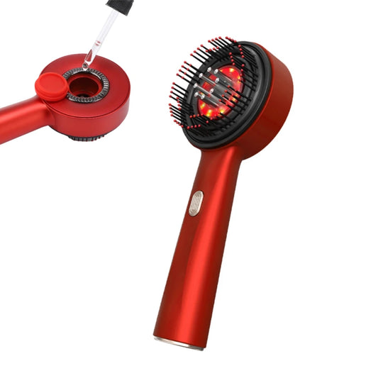 Red handheld scalp massager for hair growth with LED lights and dropper for hair treatment application