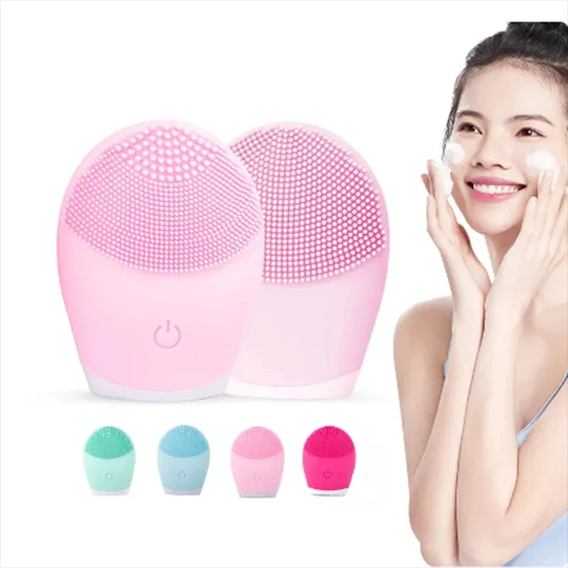 Pink silicone facial cleansing brush with a smiling woman applying foam on her face from Zorelie.co
