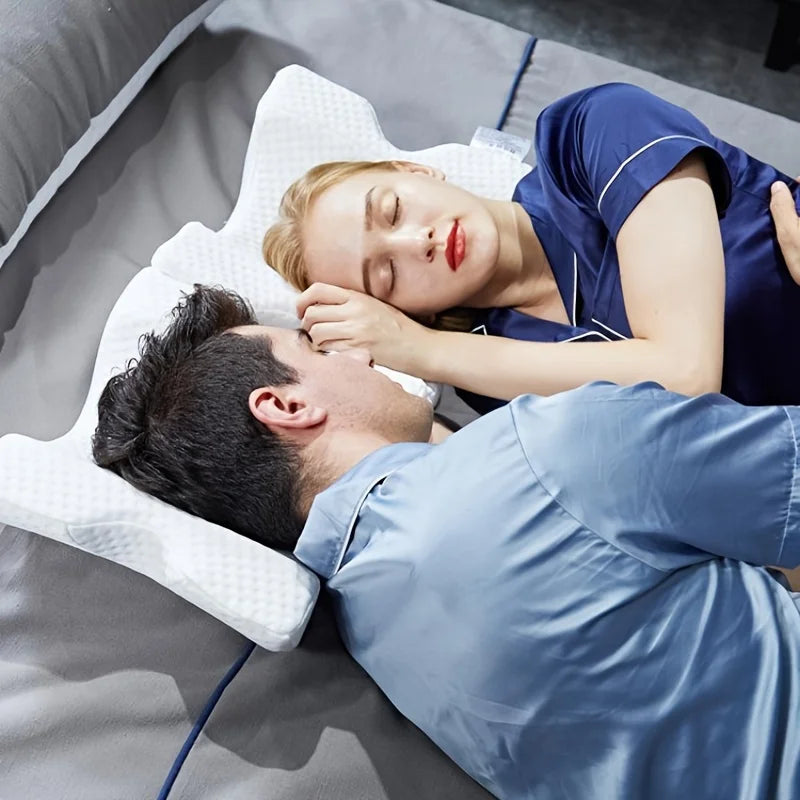 Couple lying on bed resting with Zorelie slow rebound memory foam pillow for enhanced comfort