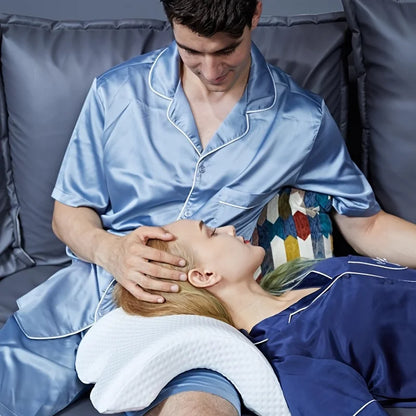 Couple relaxing with a slow rebound memory foam pillow providing head and neck support