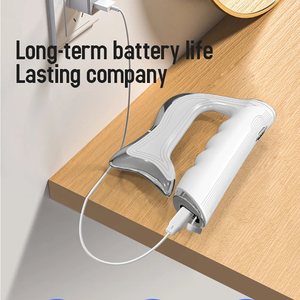 Zorelie.co smart muscle recovery tool with long-term battery life charging on wooden surface