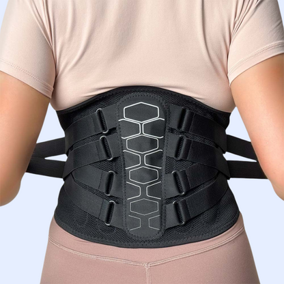 Zorelie.co black lumbar back brace for pain relief worn on lower back with adjustable straps