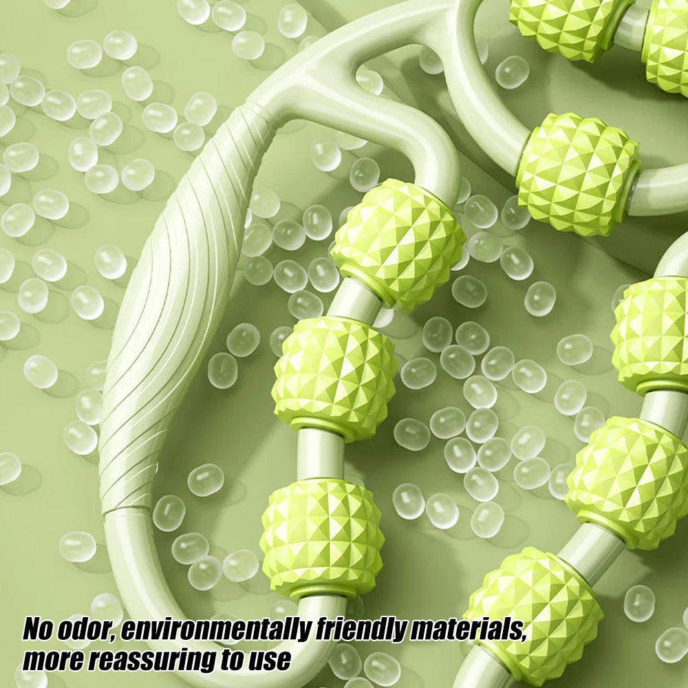 Green handheld muscle massage roller with textured spiked rollers on green background with clear beads