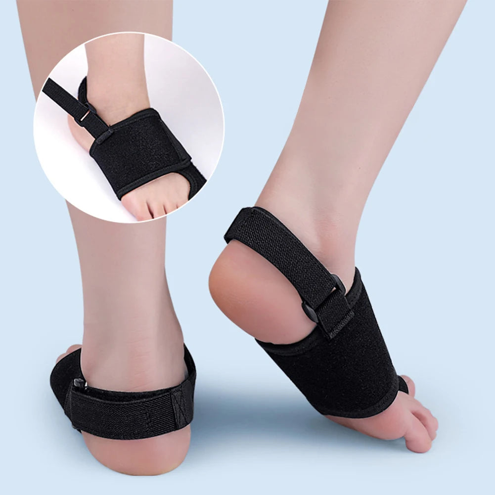 Black adjustable toe corrector for bunion relief worn on feet with strap support from Zorelie.co