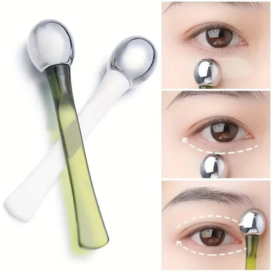 Zorelie.co under eye roller massage stick with metal head used to reduce puffiness and refresh under eye area