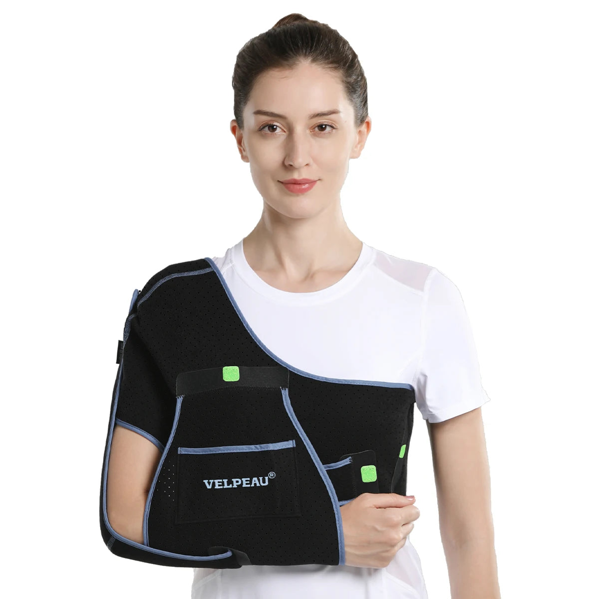 Woman wearing a black arm sling for elbow injury with blue trim and adjustable straps