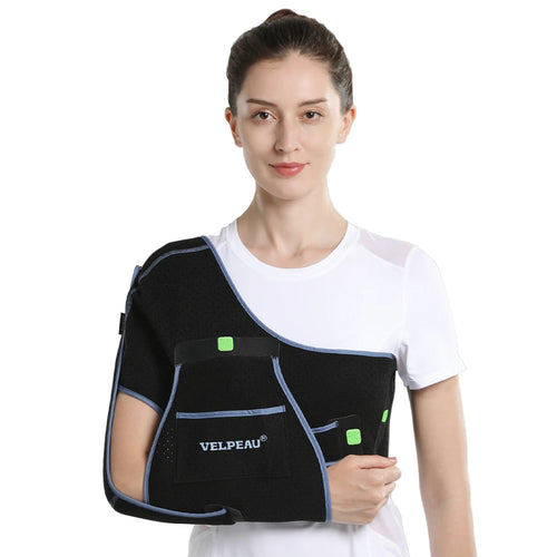 Zorelie.co black arm sling for elbow injury worn by woman in white shirt for support and comfort