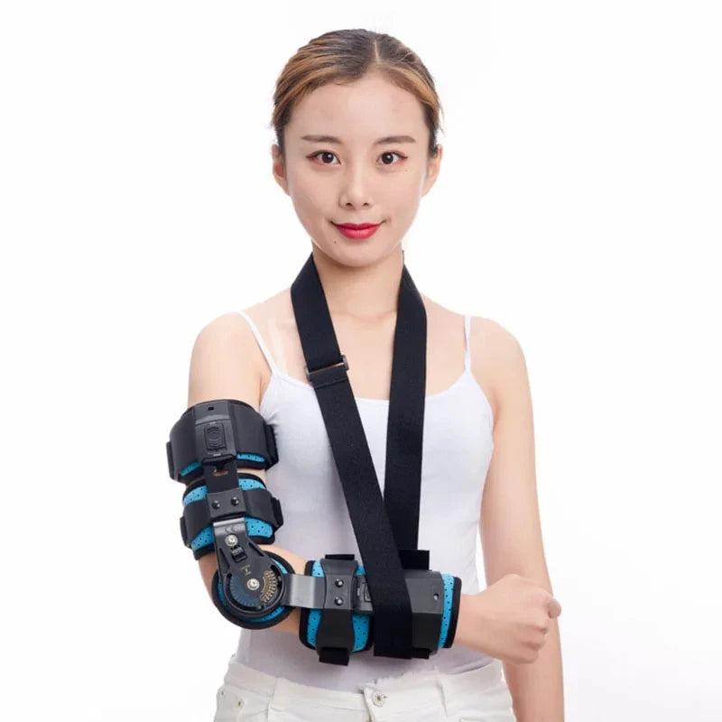 Woman wearing adjustable hinged elbow brace with black and blue straps for arm support