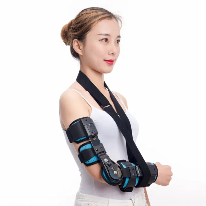 Woman wearing an adjustable hinged elbow brace with support straps and metal hinges