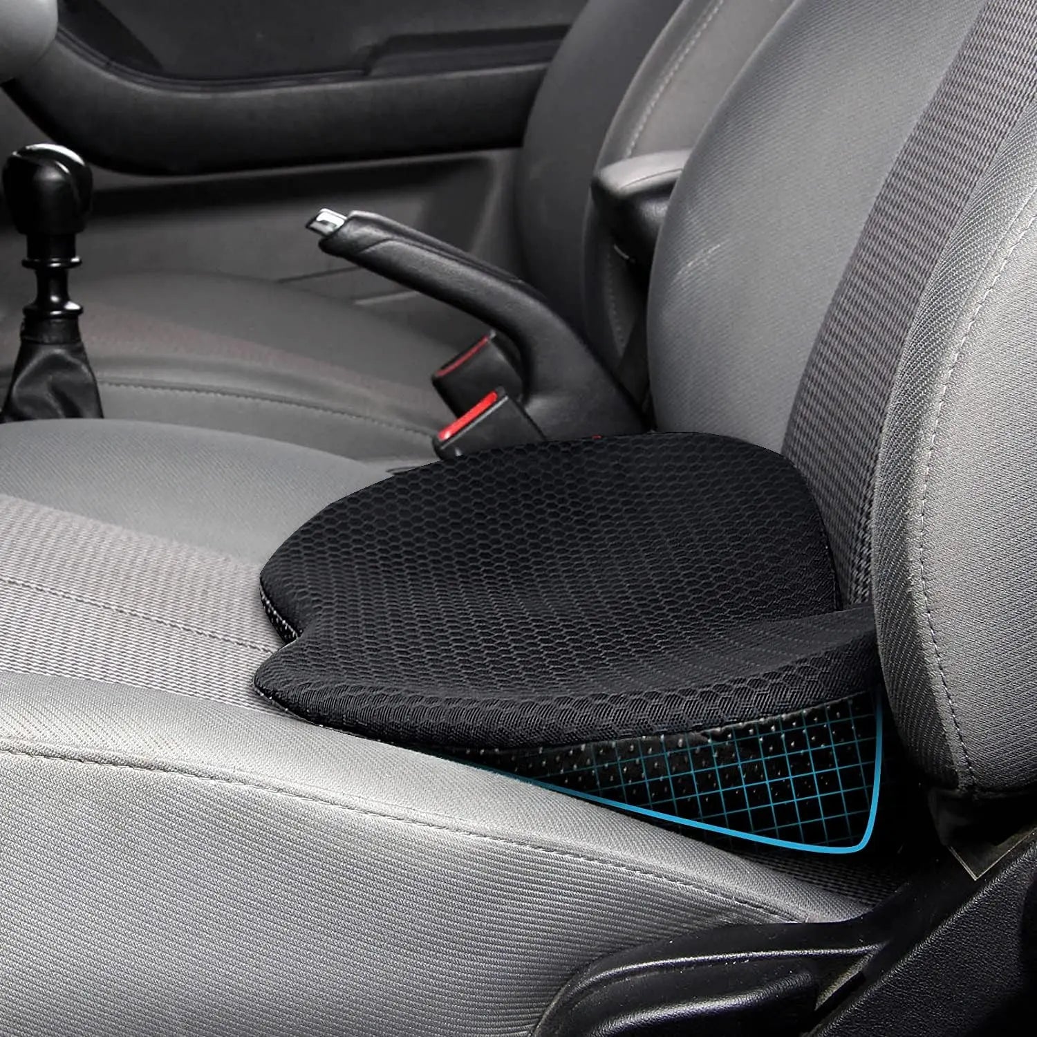 Black memory foam car seat cushion placed on gray car seat for enhanced comfort and support