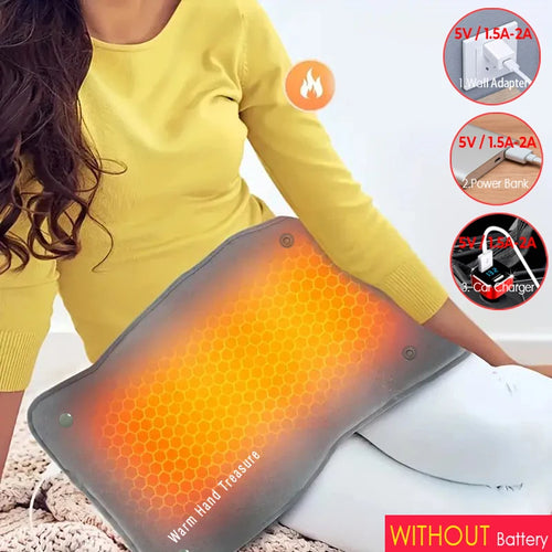 Woman using gray graphene heating pad for pain relief on her lap showing heat and compatible power sources